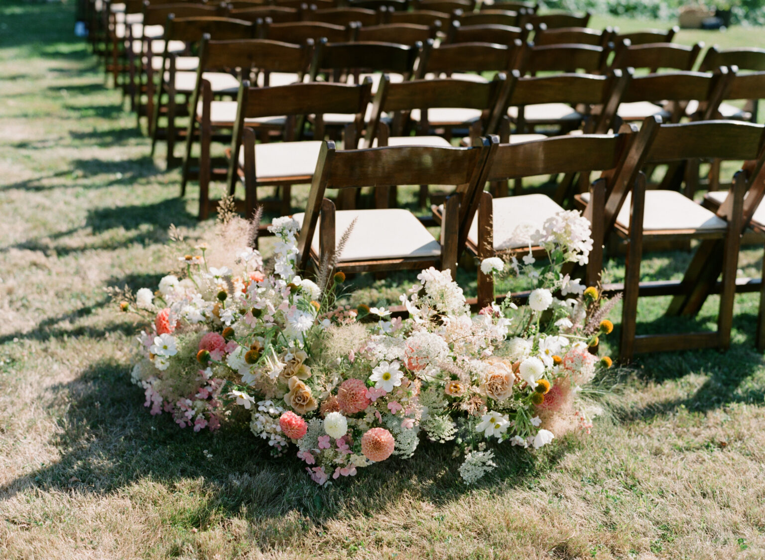 Aisle Flowers for a Summer Wedding designed by Seattle wedding florist Noctua Florals
